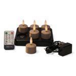 Sættet med genopladelige fyrfadslys i beige indeholder 6 fyrfadslys (op til 400 timers brændetid), en fjernbetjening og en opladebase.