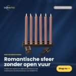 Sæt med 6 rosa LED-dinerlys (250 mm) i sort holder, genopladelige og dæmpbare, leveres med fjernbetjening og strømadapter. Skaber romantisk stemning uden åben ild. Dorsetto-logo vises øverst.
