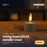 Genopladelige LED-fyrfadslys i olivengrøn lyser varmt op på en mørk overflade. Sikker, røgfri stemning fremhæves med teksten. Dorsetto-logo vises øverst, og en "Shop nu"-knap inviterer til køb af 12 stk. med fjernbetjening, op til 400 timers brændetid.