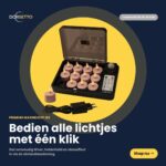 Sættet indeholder 12 genopladelige fyrfadslys i rosa med op til 400 timers brændetid, fjernbetjening og oplader - teksten på dansk fremhæver fjernbetjening og timerfunktion for de premium fyrfadslys.